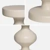Collage of close-up shots of a cream-colored side table. Anteprima dell’immagine prodotto