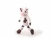 A plush toy cow stands against a white background. Produktbild-Vorschau