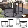 A collage of images showing a set of two round coffee tables with black marble tops and black metal frames. The top section shows the tables in a living room setting on a blue rug, with a sofa and flowers in the background. The bottom section shows the tab Náhľad obrázku produktu