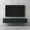 A modern, wall-mounted TV stand with a flat-screen television above it, set against a concrete wall. Anteprima dell’immagine prodotto