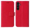 A red flip phone case with floral embossed patterns is shown open, displaying the inside and the camera cutout area. Produktbild-Vorschau