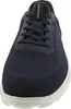 A close-up front view of a navy blue sneaker. Voir les images du produit
