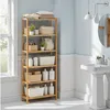 A bathroom shelf unit filled with various items, next to a sink and mirror. Produktbild-Vorschau