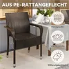 A brown rattan garden chair is shown on a patio next to a table with a white tablecloth. Produktbild-Vorschau