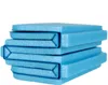 A stack of folded blue foam seat cushions. Produktbild-Vorschau