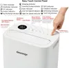A close-up view of the top control panel of a white dehumidifier, with labels and a hand pointing to a button. Anteprima dell’immagine prodotto