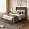A bedroom scene with a bed, nightstand, and curtains. Náhled obrázku produktu