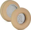 Two beige ear pads for headphones, one labeled 'L' and the other 'R', are shown against a white background. Podgląd zdjęcia produktu