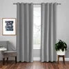 A room with a window covered by gray curtains, a chair, and a plant. Voir les images du produit