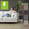 A woman relaxing on a white sofa in a room with vertical wooden wall panels and a plant. Náhled obrázku produktu