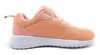 A side view of a single pink and white child's sneaker against a white background. Podgląd zdjęcia produktu