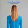 A split image showing the back of a person's head with their hair styled differently on each side, demonstrating the effect of a hair product or tool. Produktbild-Vorschau