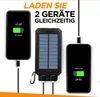 A solar power bank is shown charging two smartphones simultaneously. Produktbild-Vorschau
