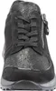 A close-up front view of a black women's sneaker. Produktbild-Vorschau