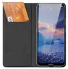 A black flip case for a smartphone, with two credit cards inserted into a slot on the inside cover. The smartphone is open and displaying its screen. Produktbild-Vorschau