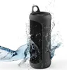 A black Hama Bluetooth speaker is shown with water splashing around it. Produktbild-Vorschau