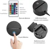 Collage of images showing a remote control, a lamp base with USB and battery compartments, and a hand touching the lamp base. Náhled obrázku produktu