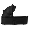 A side view of a black baby stroller bassinet. Produktbild-Vorschau