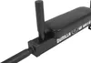 A close-up view of a black dip station attachment with a padded seat and handles. Produktbild-Vorschau
