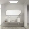 A modern bathroom with a double sink vanity and a large mirror. Produktbild-Vorschau