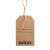 A brown paper tag with twine attached, featuring text and a decorative border. Podgląd zdjęcia produktu