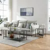 A modern living room scene featuring a sectional sofa, coffee table, and side table. Podgląd zdjęcia produktu