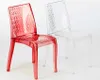 Two transparent chairs, one red and one clear, are shown against a white background. Anteprima dell’immagine prodotto