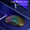 A gaming mouse with RGB lighting is shown on a desk next to a keyboard and monitor. Produktbild-Vorschau
