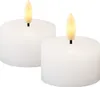 Two white LED tea lights with yellow flames on a white background. Produktbild-Vorschau