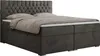 A dark gray boxspring bed with a tufted headboard, mattress, and topper, shown from a slightly angled front view against a white background. Produktbild-Vorschau
