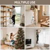 Collage of four images showing a step ladder being used in different scenarios: storing items on shelves, reaching into a kitchen cabinet, decorating a Christmas tree, and changing a light bulb. Produktbild-Vorschau