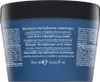 The image shows the back of a dark blue hair mask container with text in multiple languages. Náhled obrázku produktu