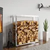 A modern living room with a wood-burning stove and a metal firewood rack filled with logs. Podgląd zdjęcia produktu