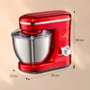 A red stand mixer with a silver bowl is shown against a light beige background, with dimension lines indicating its size. Produktbild-Vorschau