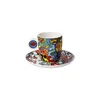 A colorful espresso cup and saucer set. Voir les images du produit