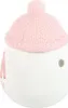 A white ceramic oil burner with a pink knitted hat lid. Voir les images du produit