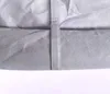 A close-up view of a gray fabric product, possibly a cover or tarp, with a strap detail. Produktbild-Vorschau