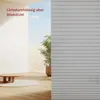 A room with a table and a plant, with blinds covering the window. Produktbild-Vorschau