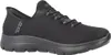 A black Skechers slip-on shoe is shown from the side against a white background. Voir les images du produit