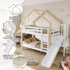 A children's bunk bed with a slide and ladder, set up in a bedroom. Podgląd zdjęcia produktu
