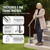 A woman is leaning on an outdoor handrail on a set of stairs. Anteprima dell’immagine prodotto