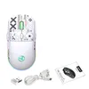 A white gaming mouse with black graphic designs, along with its accessories and manual, is displayed on a white background. Produktbild-Vorschau