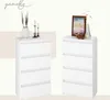 Two white dressers are shown, one on the left with decorative items on top and another on the right with decorative items and a framed picture on top. Produktbild-Vorschau