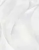A close-up abstract view of white fabric with flowing lines and shadows. Náhled obrázku produktu