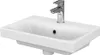 A white ceramic sink with a chrome faucet against a white background. Produktbild-Vorschau