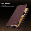 A close-up shot of a red leather phone case for a Google Pixel 6 Pro, shown on a wooden surface. Produktbild-Vorschau