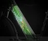 Close-up of an electric bike battery pack with glowing green energy and lightning effects. Voir les images du produit