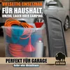 A clear plastic storage box filled with items like an orange extension cord, a red funnel, a blue cloth, and a silver spray can, placed in front of a car in a garage setting. A dark gray lid is partially visible on the right. Produktbild-Vorschau