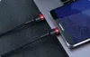 A close-up shot of two USB-C cables being plugged into a laptop and a smartphone. Podgląd zdjęcia produktu