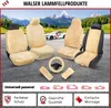 A collection of sheepskin car seat covers and accessories displayed on a grey surface with a mountainous landscape in the background. Náhľad obrázku produktu
